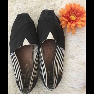 TOMS black university stripe rope sole slip ons